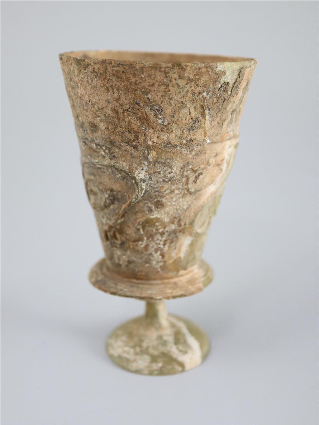 An Islamic colourless glass goblet, Iran, 12th century, 11.5cm high